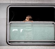 Migrantų portretai Tovarniko (Kroatija) geležinkelio stotyje