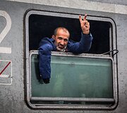 Migrantų portretai Tovarniko (Kroatija) geležinkelio stotyje