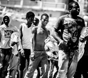 Augusta uoste (Sicilija) i&scaron; laivo i&scaron;laipinami Viduržemio jūroje i&scaron;gelbėti migrantai