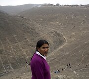 Peru policija vaiko neteisėtai žemę pasisavinusius gyventojus