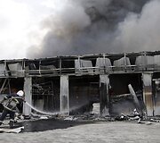 Ugniagesiai gesina gaisrą Donecke po separatistų ir Ukrainos pajėgų susi&scaron;audymo