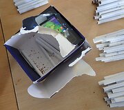 Telefono dėžutėje slėpta cigarečių kontrabanda