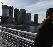 Kinijoje statomas verslo centras sulėtėjus ekonomikai stovi visi&scaron;kai tu&scaron;čias
