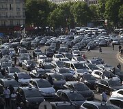 Protestuojantys Paryžiaus taksi vairuotojai