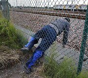 Migrantai Prancūzijoje mėgina pasiekti Didžiąją Britaniją per Eurotunelį