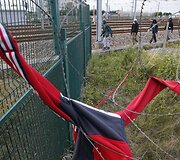 Migrantai Prancūzijoje mėgina pasiekti Didžiąją Britaniją per Eurotunelį