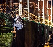 Migrantai Prancūzijoje mėgina pasiekti Didžiąją Britaniją per Eurotunelį