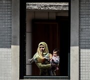 Moteris su vaiku Turkijoje