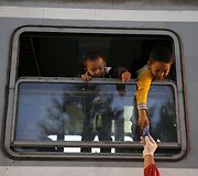 Migrantai traukiniuose