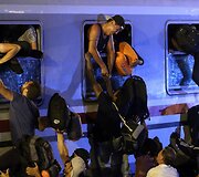 Migrantai traukiniuose