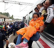 Migrantai traukiniuose