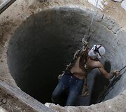 Tuneliai, kuriais palestiniečiai gabena kontrabandą i&scaron; Egipto