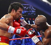 Gegužės 3 diena. &Scaron;imtmečio bokso kova tarp Manny Pacquiao ir Floydo Mayweatherio