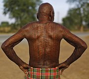 Žemiausios kastos induistai garbinantys dievą Ramą savo kūną puo&scaron;ia tatuiruotėmis