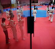 Olimpinė mokykla Kinijoje, kur čempionai auginami nuo mažens