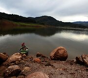 Dėl sausros Venesueloje i&scaron;niro dėl užtvankos 30 metų vandens užlietas kaimas