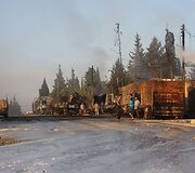 Sirijoje subombarduota humanitarinę pagalbą gabenusi sunkvežimių vilkstinė