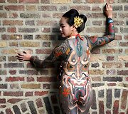 Tatuiruočių entuziastų suvažiavimo dalyvė Londone