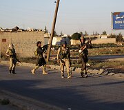 Turkijos remiami nuosaikūs sirų sukilėliai i&scaron;stūmė i&scaron; Dabiko miestelio &bdquo;Islamo valstybės&ldquo; kovotojus