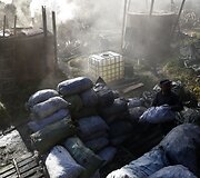 Ba&scaron;čadų kalnuose medžio anglies gamyboje dirbantys lenkai