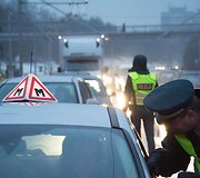 Tarptautinės Antikorupcijos dienos i&scaron;vakarėse Vilniuje surengta akcija &bdquo;Ky&scaron;is i&scaron;purvina&ldquo;