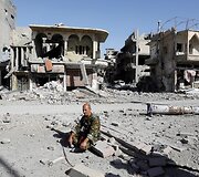 JAV remiamos pajėgos Sirijoje skelbia visi&scaron;kai užėmusios buvusią &bdquo;Islamo valstybės&ldquo; sostinę Raką
