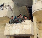 JAV remiamos pajėgos Sirijoje skelbia visi&scaron;kai užėmusios buvusią &bdquo;Islamo valstybės&ldquo; sostinę Raką