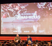 Susitikimas su Jonu Meku Londono knygų mugėje