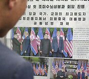 &Scaron;iaurės Korėjiečiai sutinka žinią apie Donaldo Trumpo ir Kim Jong Uno susitikimą