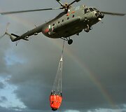Mi-8 gesinantis gaisrą