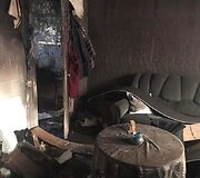 Aurelijos Bujanauskienės &scaron;eimos sudegę namai
