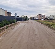 Už sąvartos zonos esančios Romaini&scaron;kių gatvės ir jos &scaron;alutinių gatvių būklė