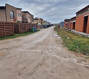 Už sąvartos zonos esančios Romaini&scaron;kių gatvės ir jos &scaron;alutinių gatvių būklė