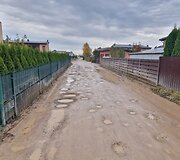 Už sąvartos zonos esančios Romaini&scaron;kių gatvės ir jos &scaron;alutinių gatvių būklė