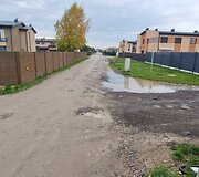 Už sąvartos zonos esančios Romaini&scaron;kių gatvės ir jos &scaron;alutinių gatvių būklė
