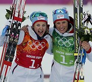 Marit Bjoergen ir Ingvild Fluqstag Oestberg laimėjo slidinėjimo komandinio sprinto rungtyje