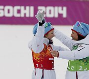 Marit Bjoergen ir Ingvild Fluqstag Oestberg laimėjo slidinėjimo komandinio sprinto rungtyje