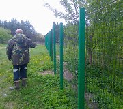 Aplinkosaugininkai pradėjo griauti neleistinas tvoras prie vandens telkinių