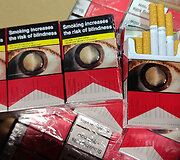Muitinės kriminalinės tarnybos pareigūnai likvidavo nelegalaus alkoholio ir cigarečių sandėlį