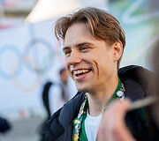 Allison Reed ir Saulius Ambrulevičius prie olimpinio kaimelio Milane.