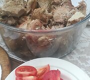 Archainiu būdu duobėje kepama mėsa