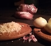 Archainiu būdu duobėje kepama mėsa