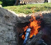 Archainiu būdu duobėje kepama mėsa