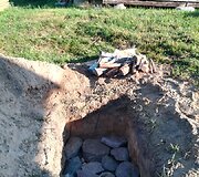 Archainiu būdu duobėje kepama mėsa
