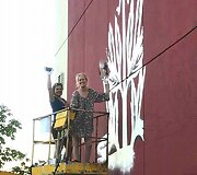 Dailininkės iniciatyva Marijampolėje ant tunelio sienų įamžinami žmonių veidai