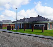 Čerpiniai stogai gyvenamųjų namų kvartale Panevėžyje
