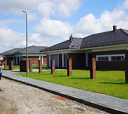 Čerpiniai stogai gyvenamųjų namų kvartale Panevėžyje