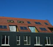 Čerpiniai stogai gyvenamųjų namų komplekse Kur&scaron;ių Nerijoje