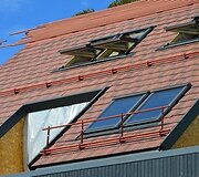 Čerpiniai stogai gyvenamųjų namų komplekse Kur&scaron;ių Nerijoje