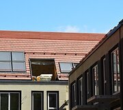 Čerpiniai stogai gyvenamųjų namų komplekse Kur&scaron;ių Nerijoje